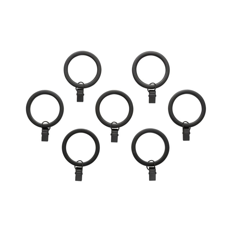 Set of seven matte black rings with clips.
