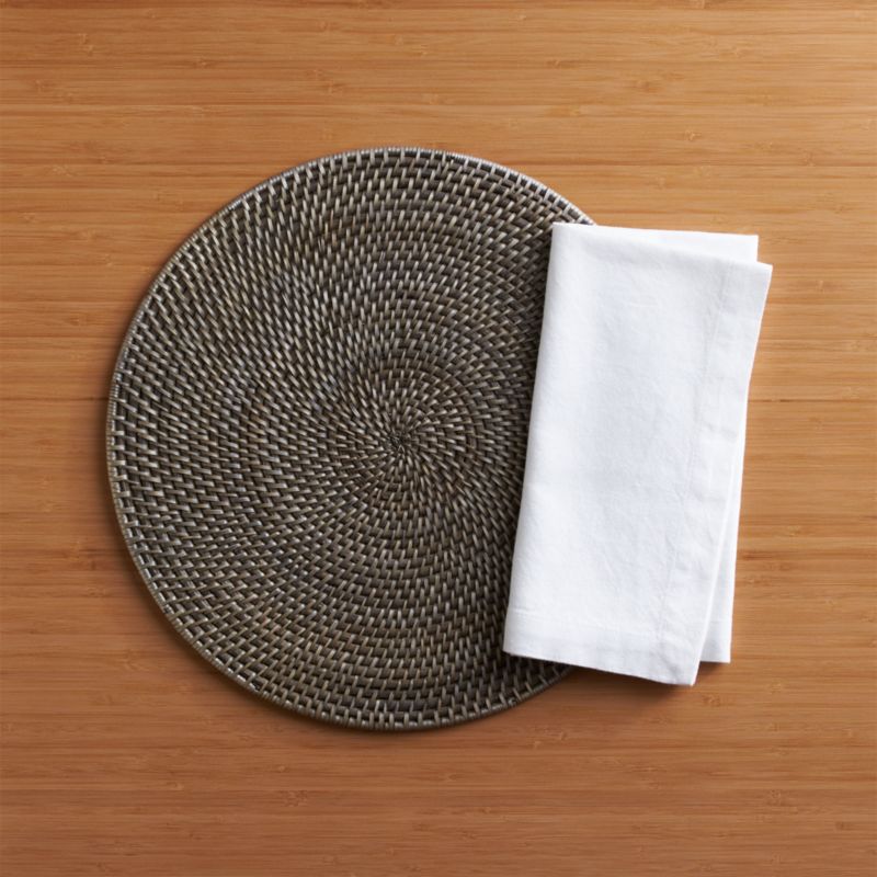 Artesia Grey Rattan Round Placemat and Abode Napkin Crate and Barrel