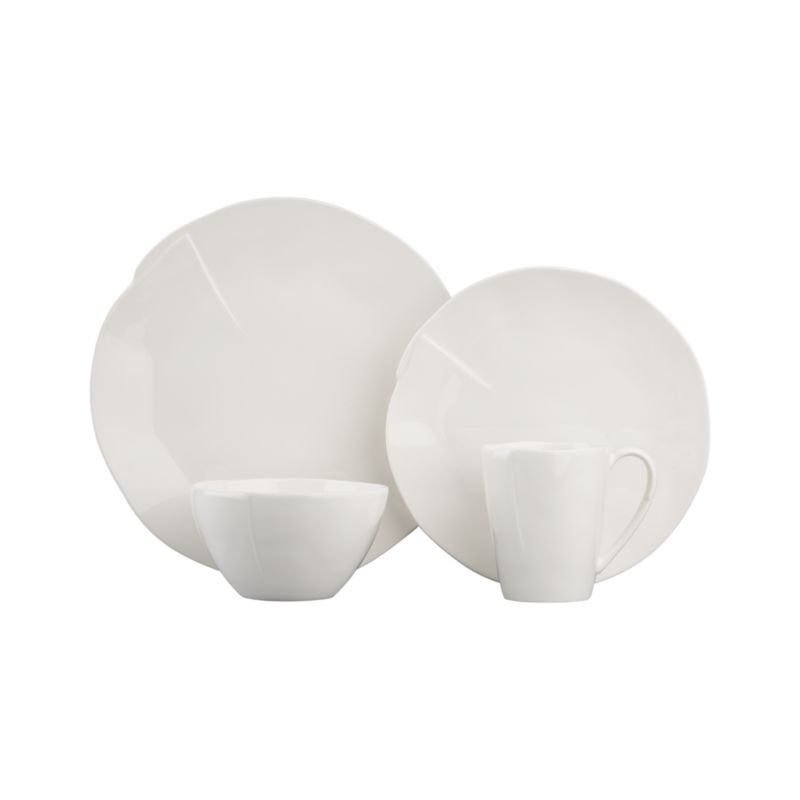 4-piece place setting: dinner plate, salad plate, bowl and mug.