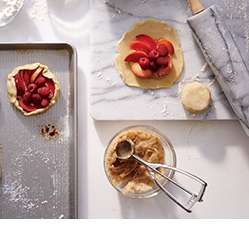 Making a dessert using nonstick baking sheet, a French Kitchen Marble Pastry Slab and Cookie Dough Scoop