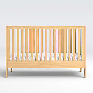 white and wood nursery furniture