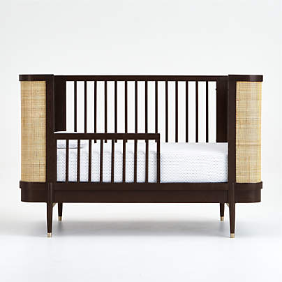 black and natural wood crib