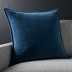 blue cushions and throws