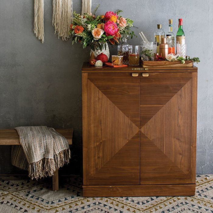  Maxine Bar Cabinet with drinks and flowers on top