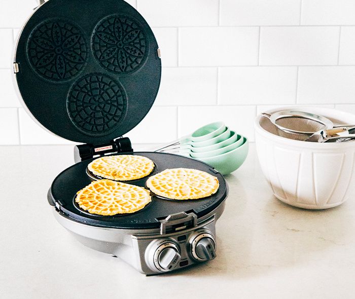Italian Pizzelles Cooking in a Pizzelle Maker