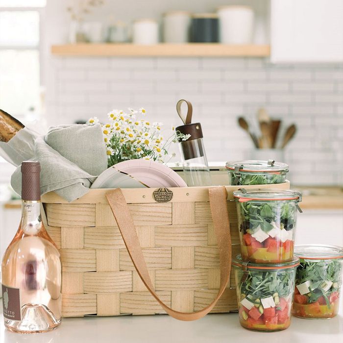 Leather Handled Picnic Basket with wine, salads, and dinnerware. 