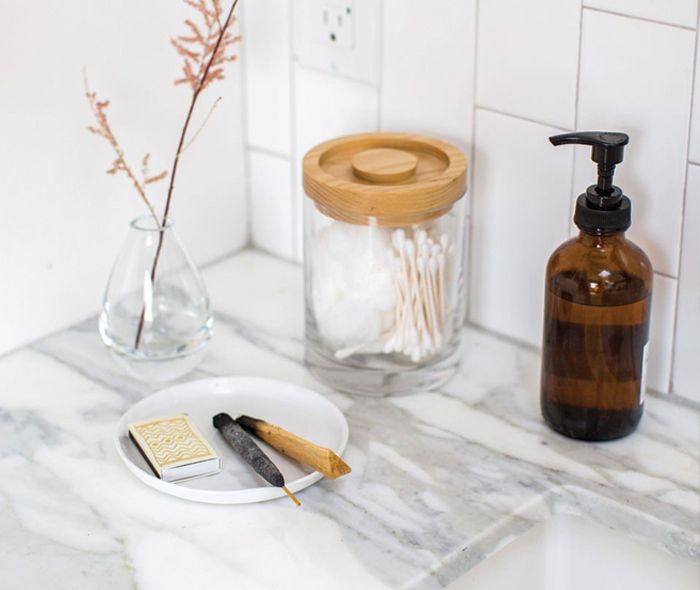 Burning Incense on a Mercer Appetizer Plate. Cotton Swabs held in a Ola Small Wood Lid Glass Canister