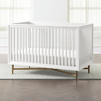 white and walnut crib