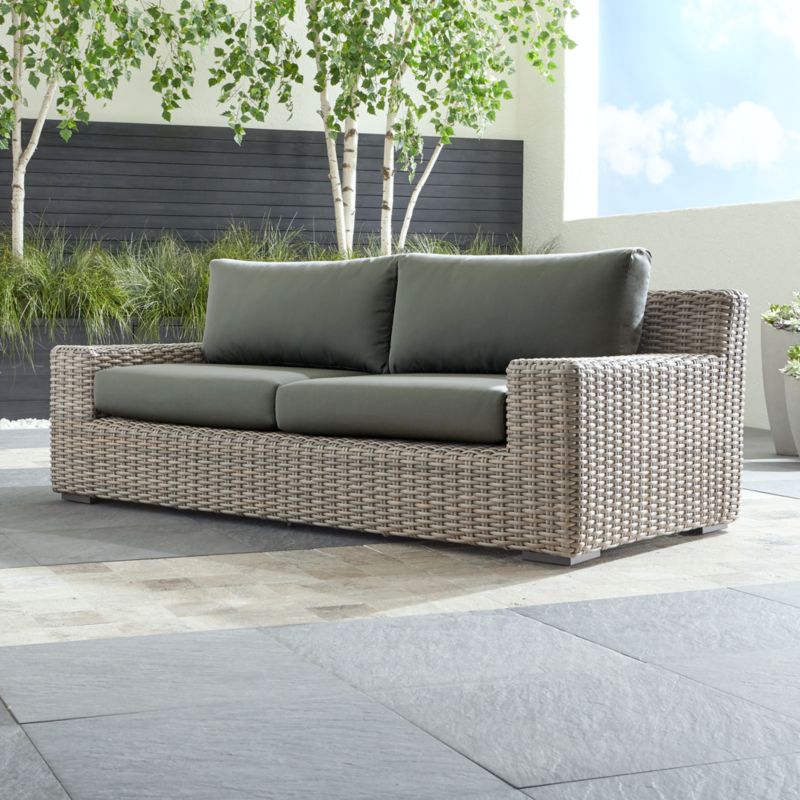 cayman outdoor sofa with graphite sunbrella cushions