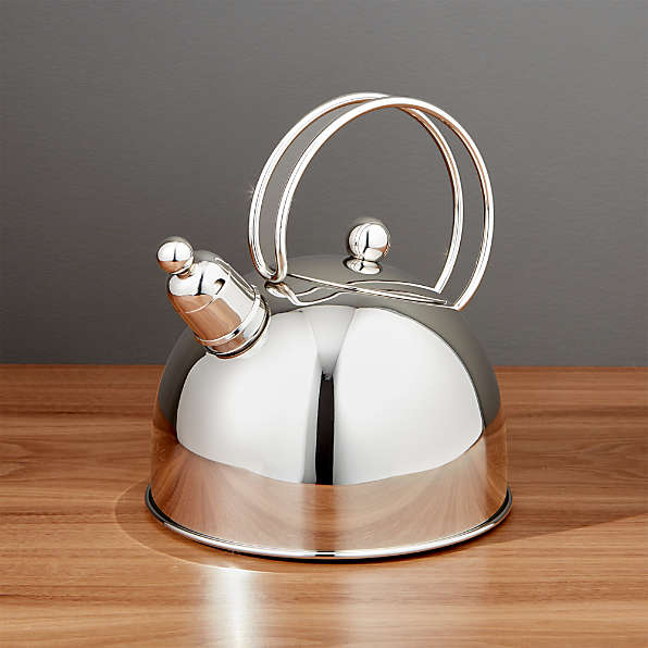 cream and silver kettle