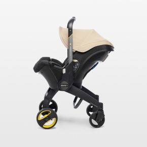 Image of Doona ™ Sahara Sand Compact Infant Car Seat & Stroller with Base