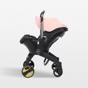 Image of Doona ™ Blush Pink Compact Infant Car Seat & Stroller with Base