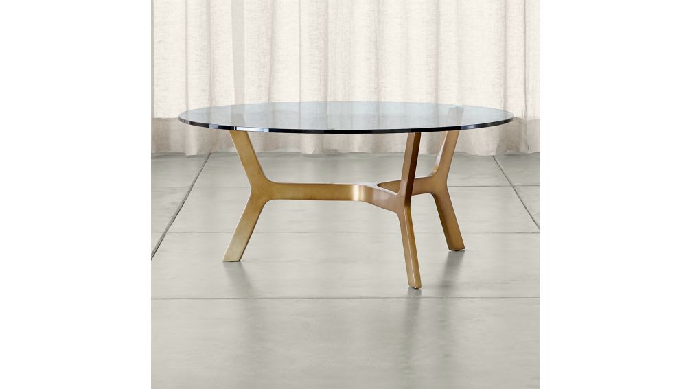 Elke Round Glass Coffee Table with Brass Base + Reviews | Crate and Barrel