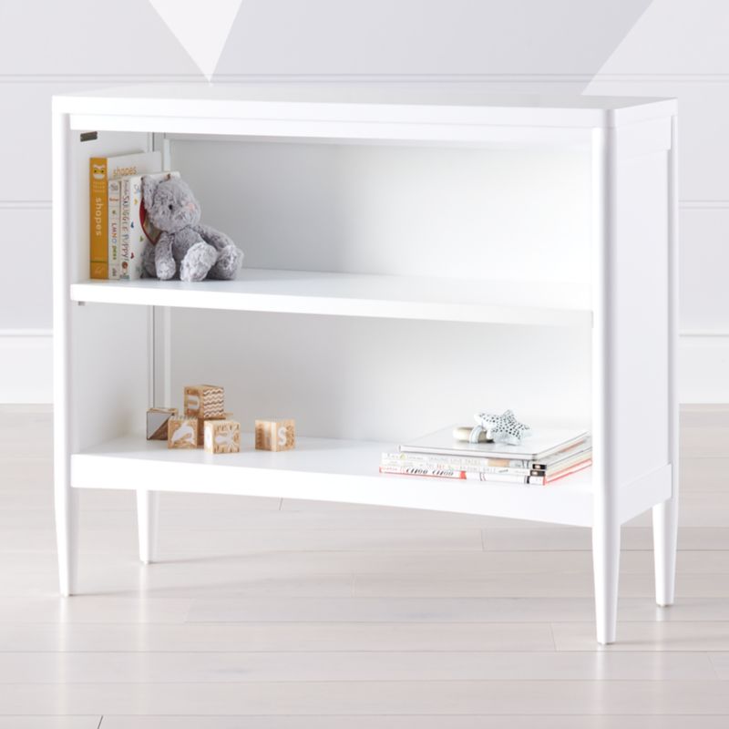 small white bookshelf nursery