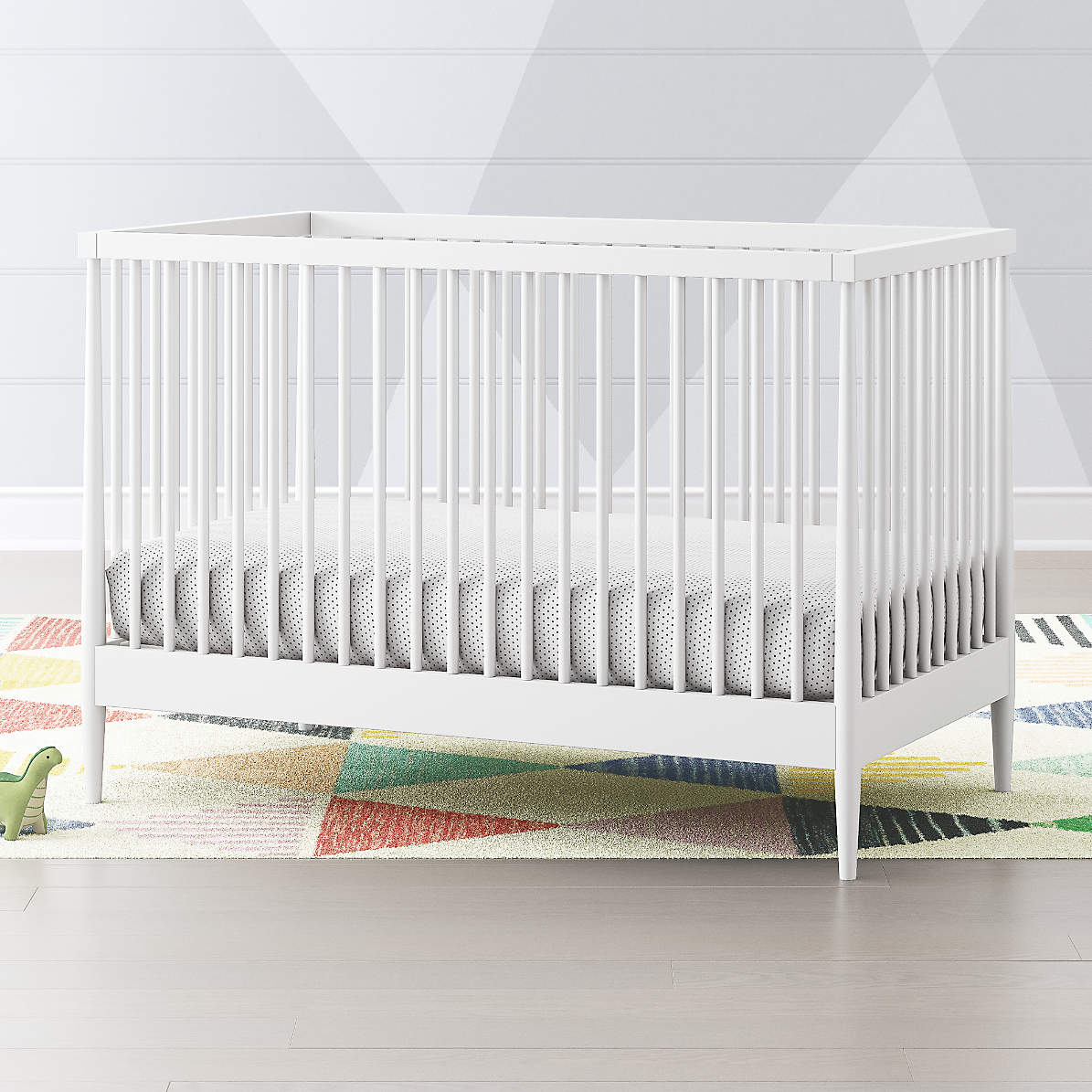 white crib with bow