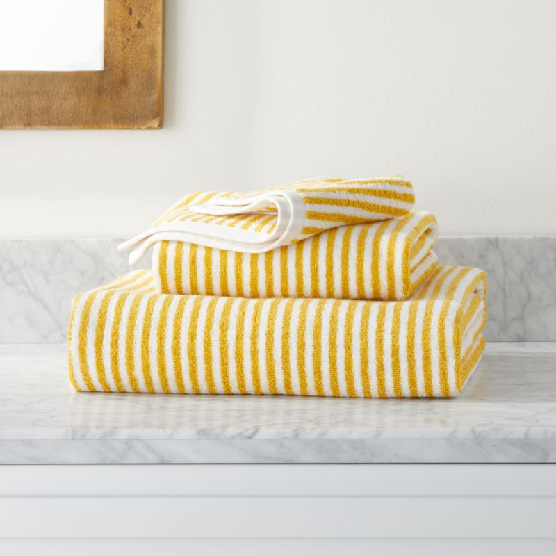 yellow and white striped bath towels