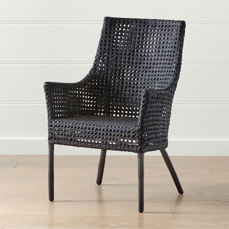 Maluku Black Rattan Dining Arm Chair + Reviews | Crate and Barrel