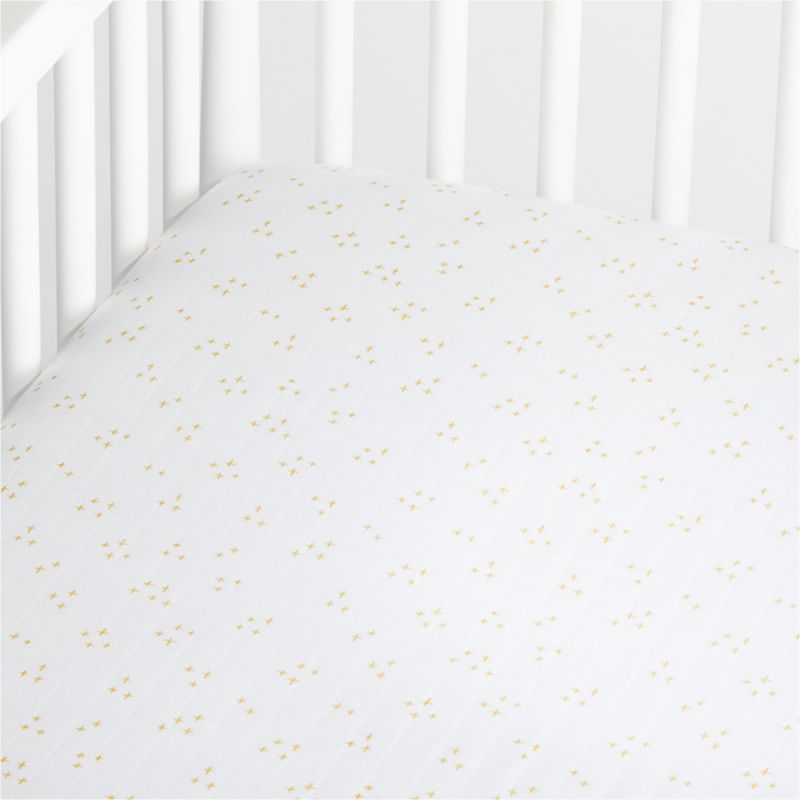 white muslin crib sheet