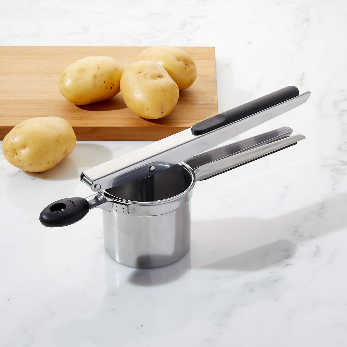 what does a potato ricer do