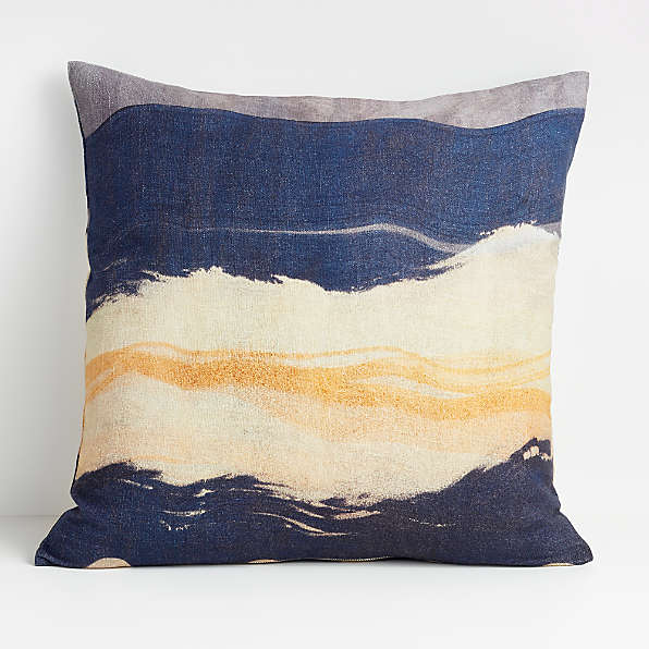 beige and blue throw pillows