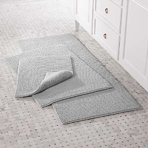 grey and white bath rugs