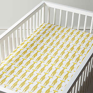 yellow crib sheet