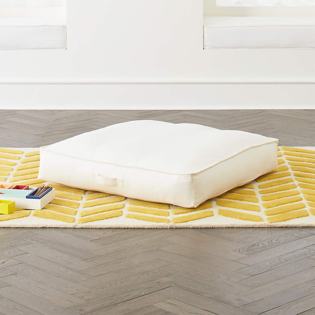 white floor cushion