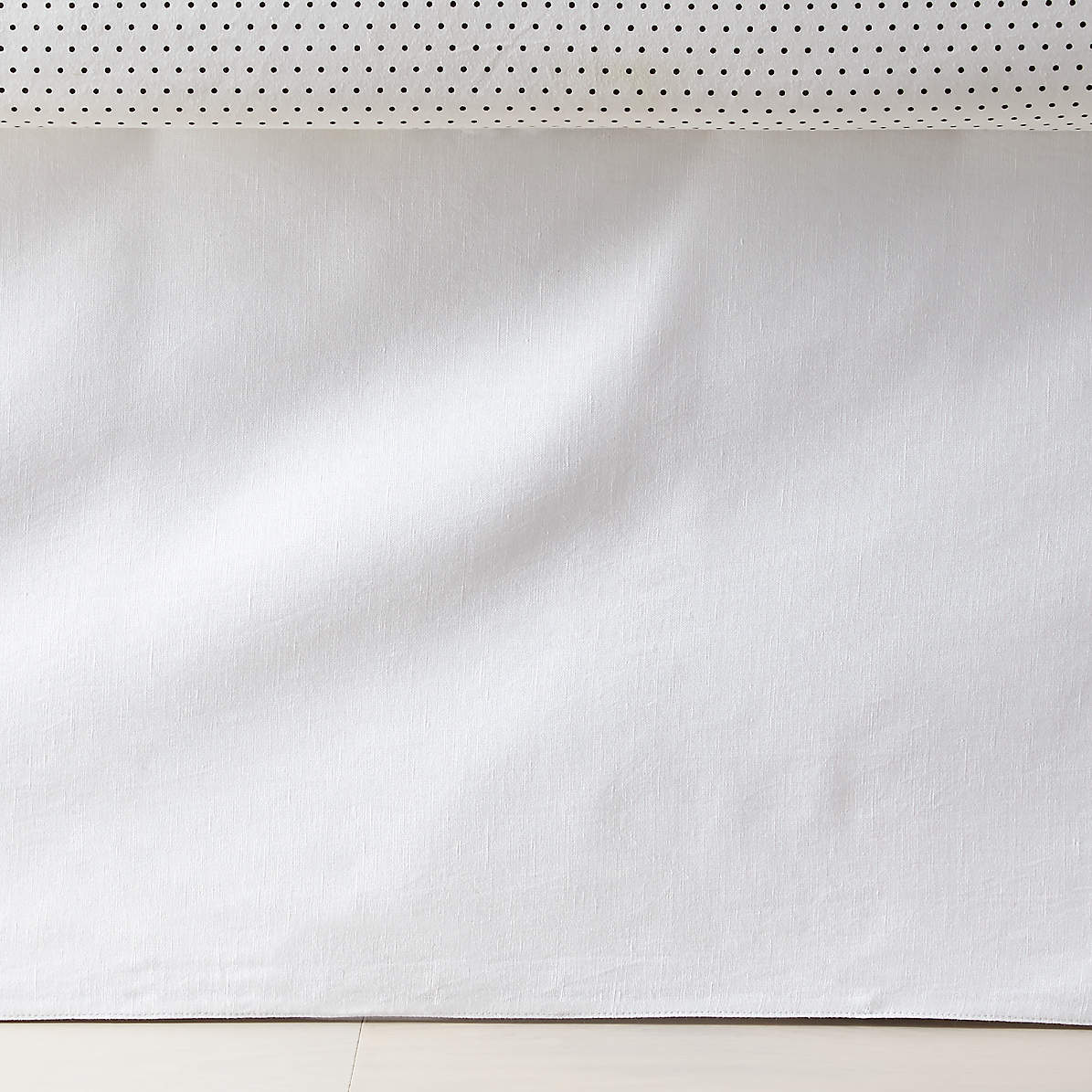 white linen crib skirt