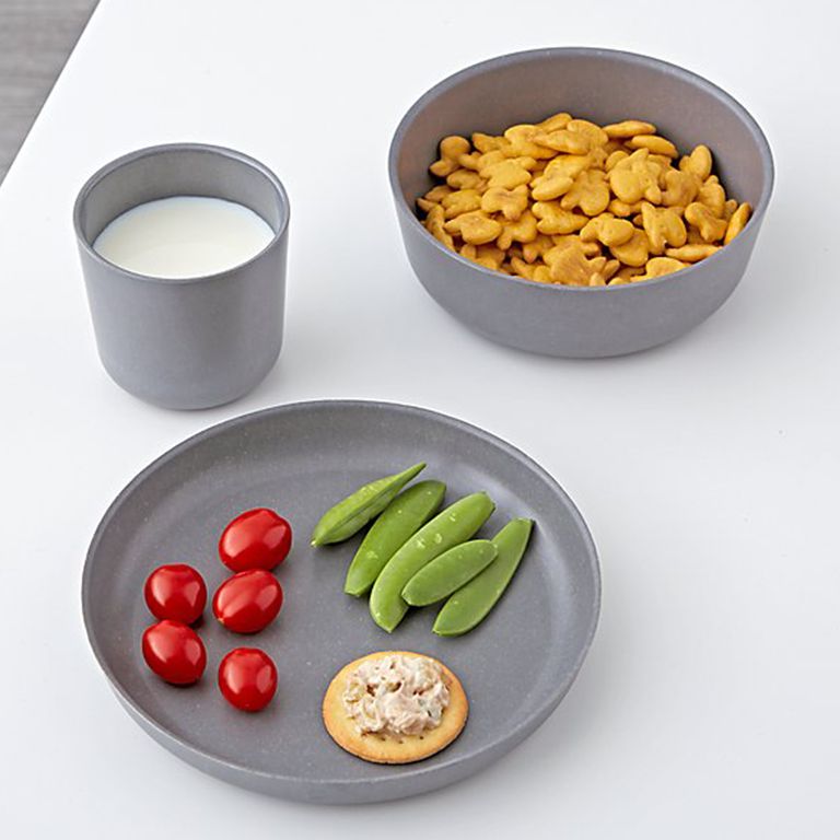 Kids' snacks on grey plastic plates