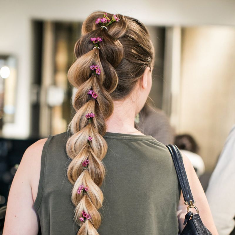 braided hair with floral details