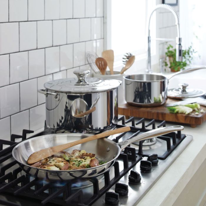 Stovetop with food cooking