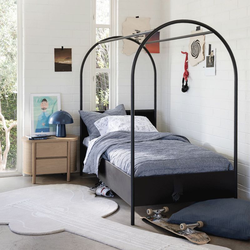 Boys room with arched canopy bed from the Leanne Ford collection