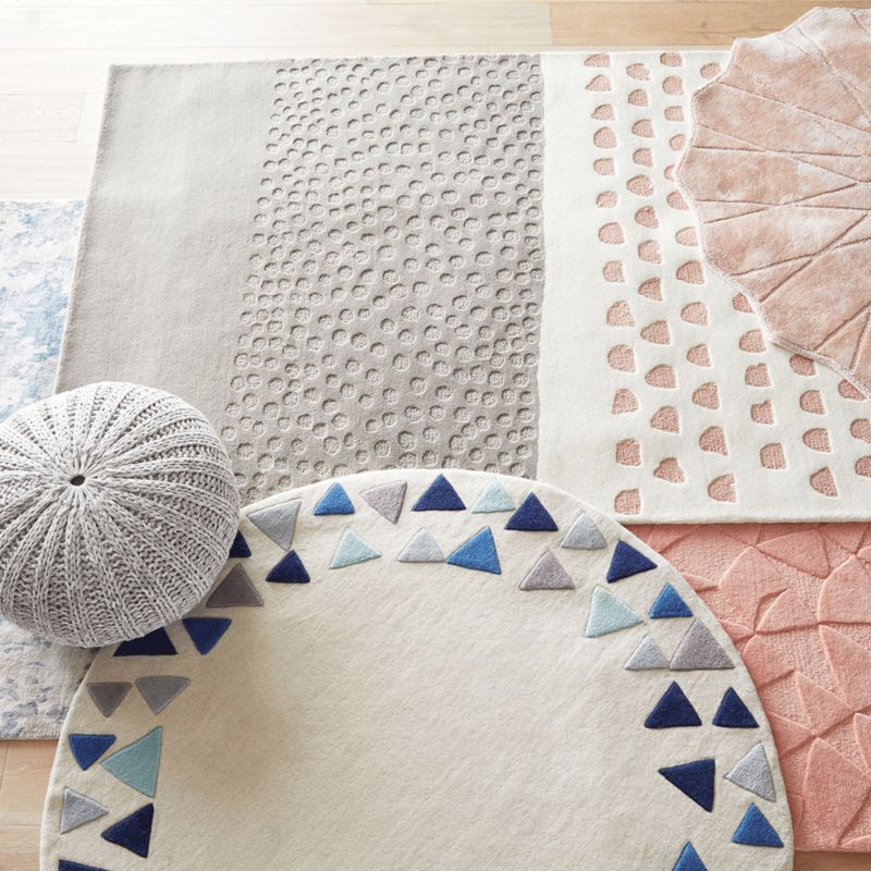 Various rugs layered