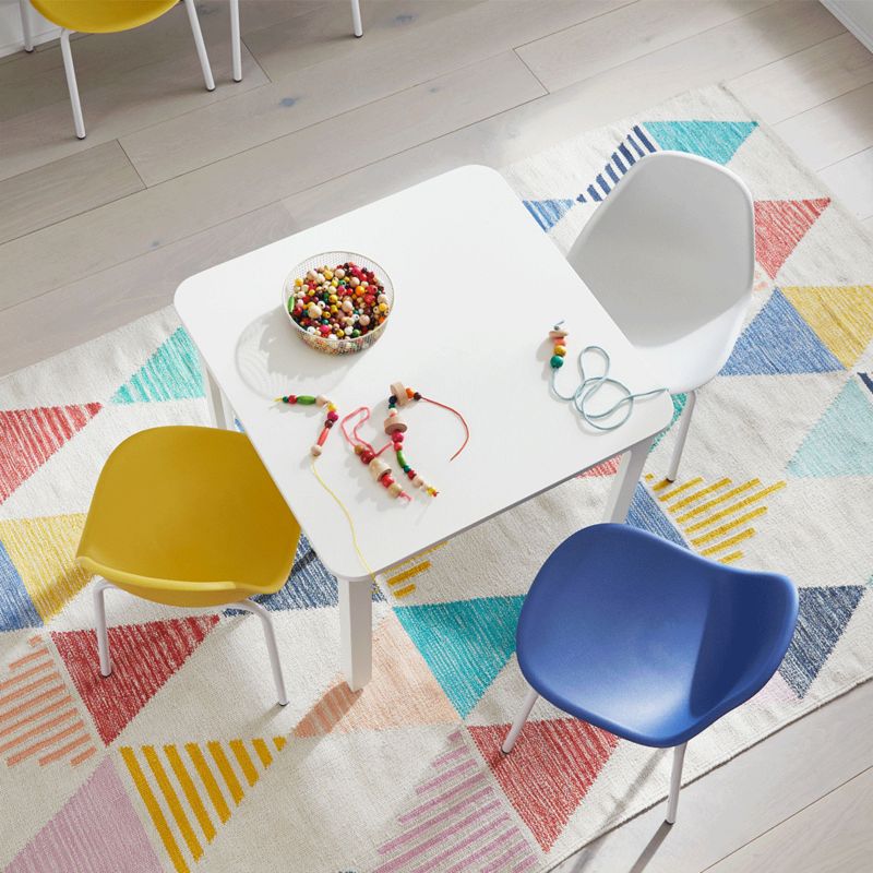 Kids play table with colorful chairs