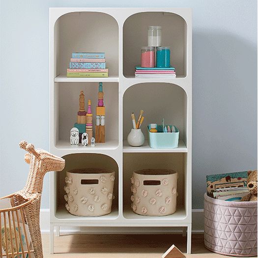 Bookcase featuring colorful decor