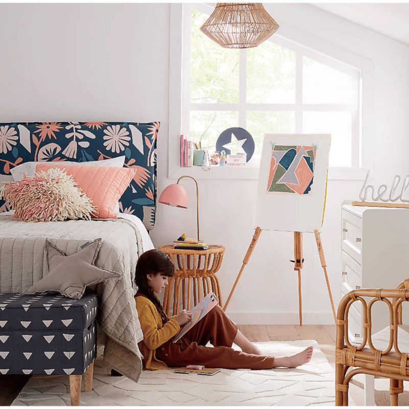 Girl reading in bedroom