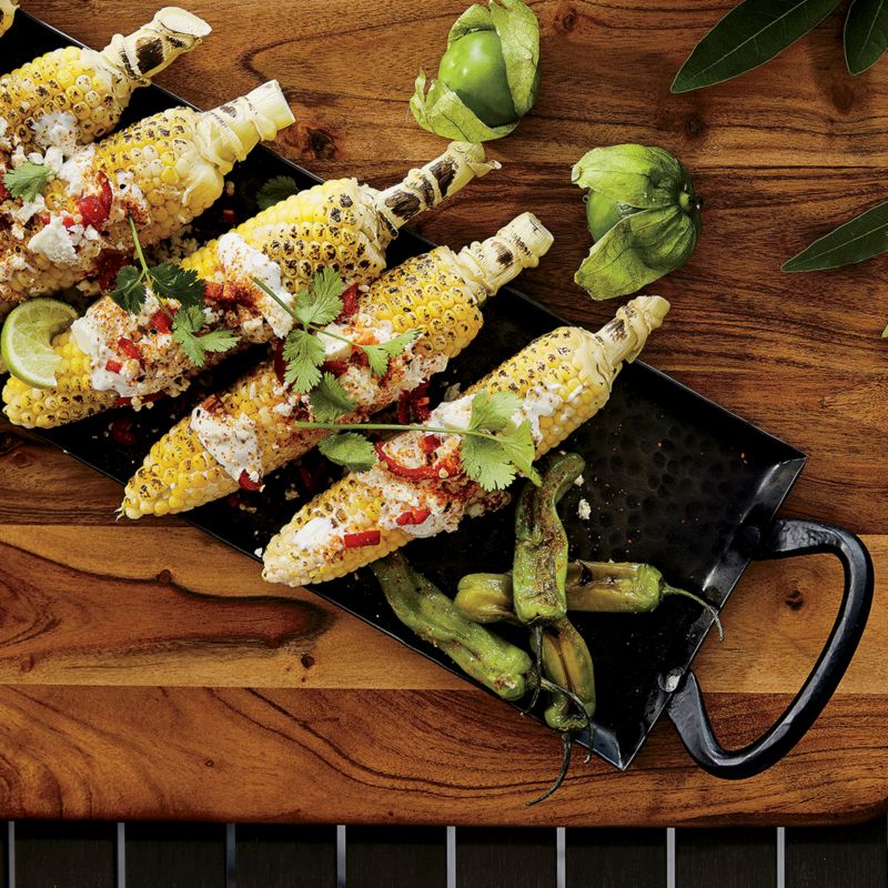 Elotes on metal serving platter