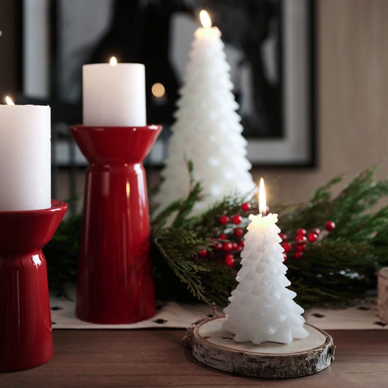 Red and white holiday candlelight arrangement