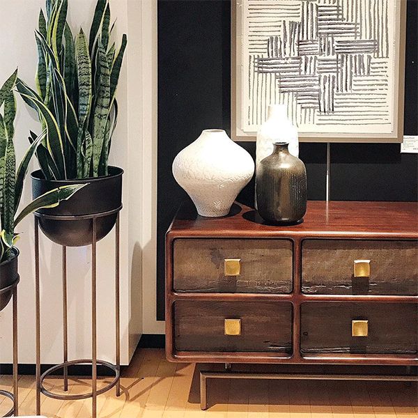 Pair of Wesley brass plant stands with bronze planters