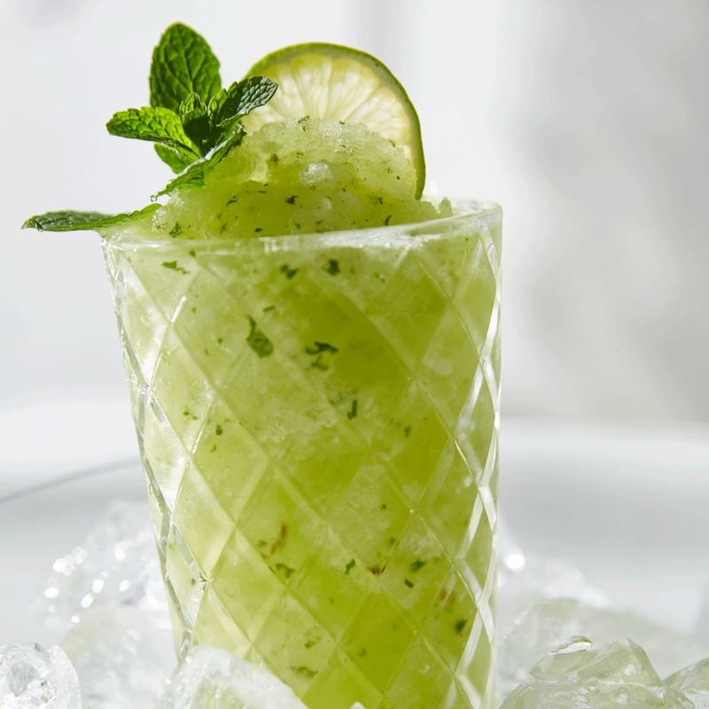 Mojito And Lemonade Summer Cold Drink In A Plastic Glass With A Straw  Coctail With Mint Lemon Lime And Ice Serve At The Bar Beverage Closeup  Stock Photo - Download Image Now 