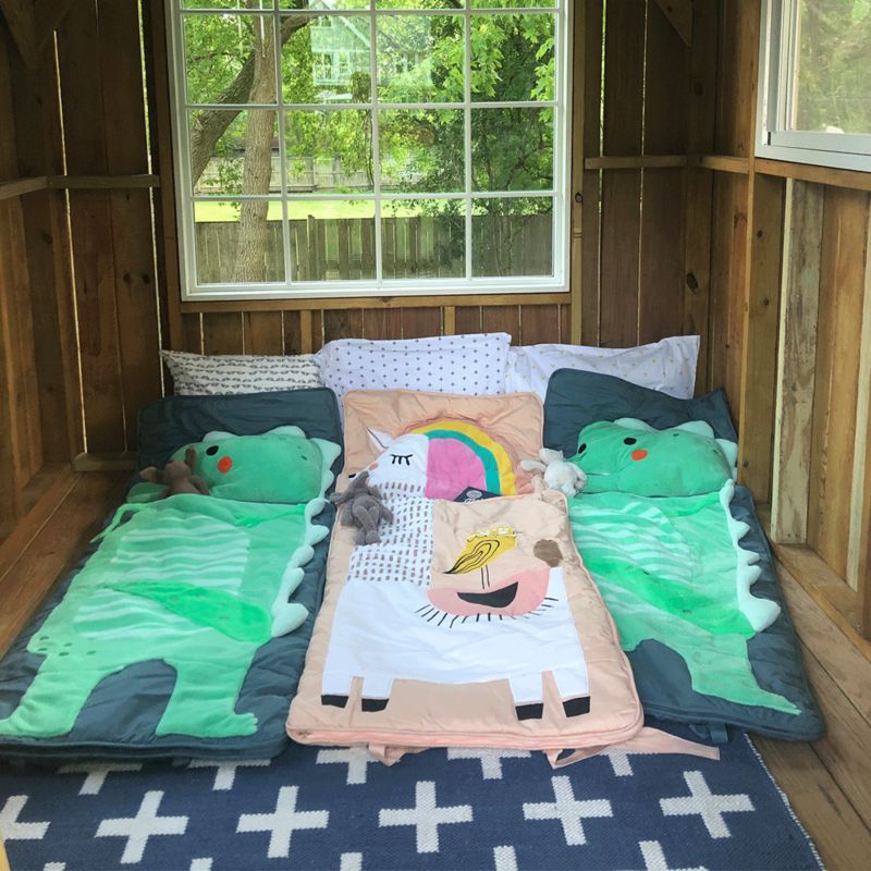Three sleeping bags in treehouse