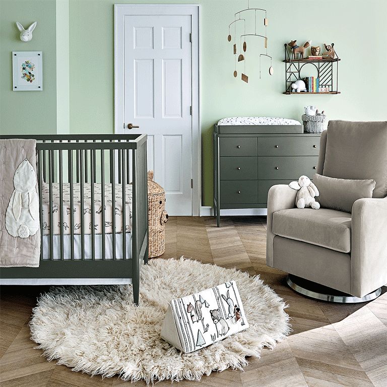 master bedroom with baby crib