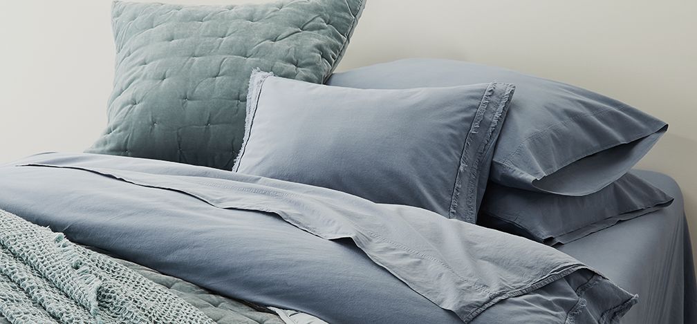 Organic Cotton blue duvet cover and pillow sham.