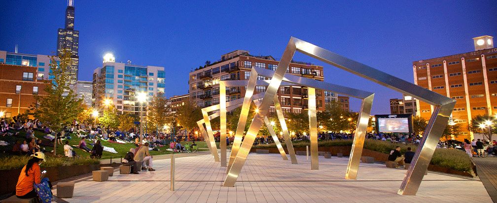 Walk-through sculpture in a Chicago park at dusk